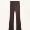 Pantalones acampanados de talle alto con bolsillos