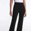 Pantalones acampanados de talle alto con efecto neopreno
