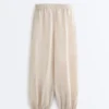 Pantalones bombachos a rayas 100 % lino
