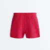 Pantalones cortos de punto trenzado lavado