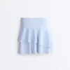 Pantalones cortos de talle alto con volantes a rayas