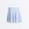 Pantalones cortos de talle alto con volantes a rayas