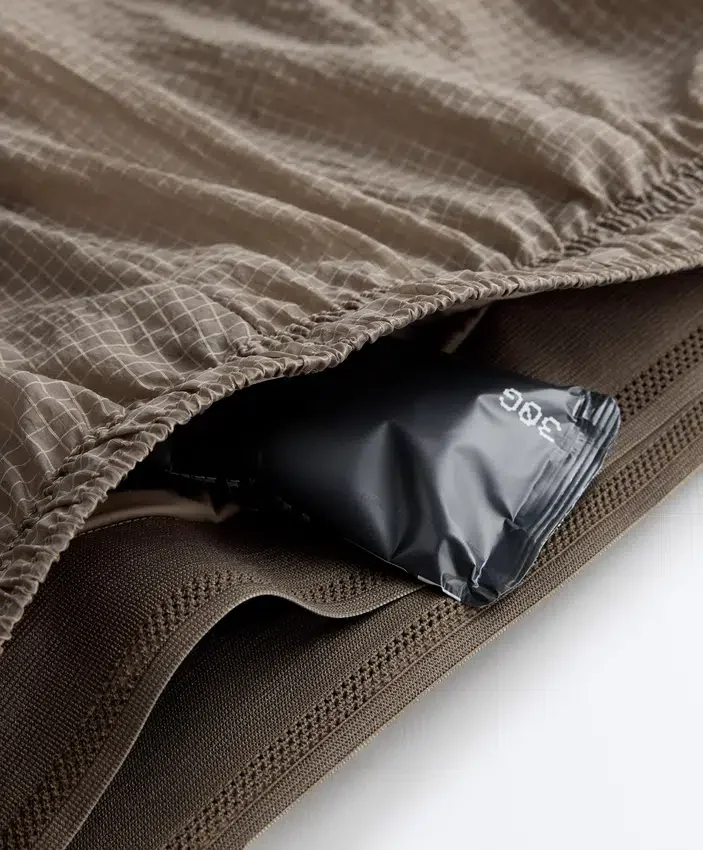 Pantalones cortos técnicos 2 en 1 a cuadros de talle medio Pantalones cortos técnicos 2 en 1 a cuadros de talle medio