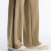 Pantalones de corte recto con efecto neopreno, cintura alta y ribete
