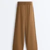 Pantalones de corte recto con estructura de punto en los laterales