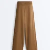 Pantalones de corte recto con estructura de punto en los laterales