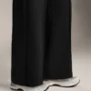 Pantalones de corte recto con modal y pliegues