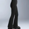 Pantalones de esquí elásticos acampanados y resistentes al agua