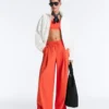 Pantalones de pierna ancha de piqué de algodón con pliegues