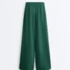 Pantalones de piqué de algodón de pierna ancha con pliegues