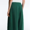 Pantalones de piqué de algodón de pierna ancha con pliegues