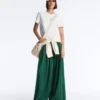 Pantalones de piqué de algodón de pierna ancha con pliegues