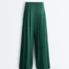Pantalones de piqué de algodón de pierna ancha con pliegues