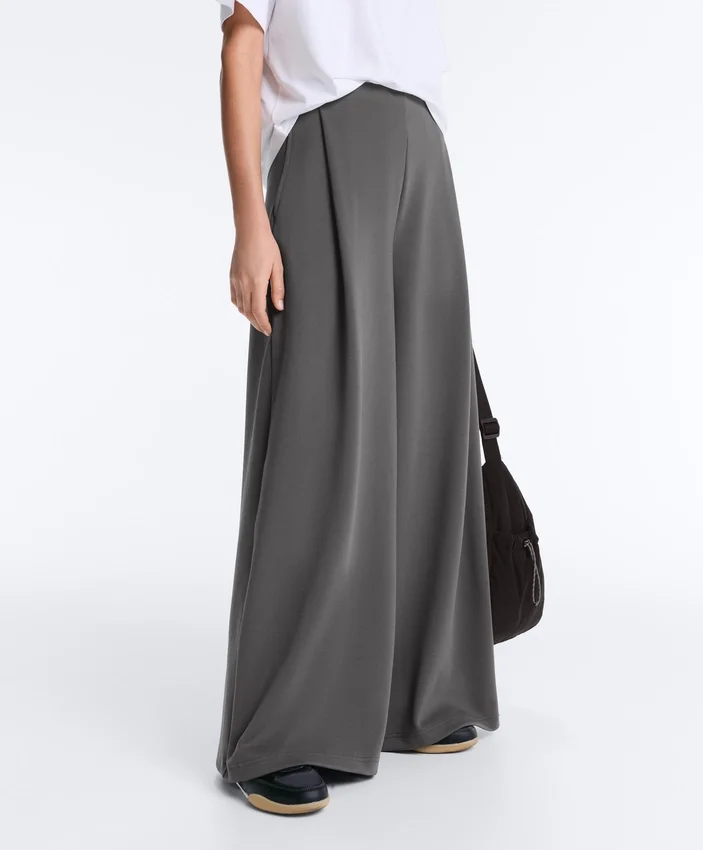 Pantalones de piqué de algodón de talle alto y corte ancho Pantalones de piqué de algodón de talle alto y corte ancho