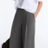 Pantalones de piqué de algodón de talle alto y corte ancho Pantalones de piqué de algodón de talle alto y corte ancho