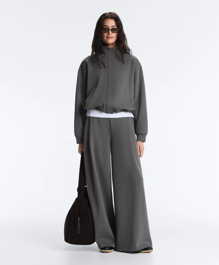 Pantalones de piqué de algodón de talle alto y corte ancho Pantalones de piqué de algodón de talle alto y corte ancho