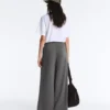 Pantalones de piqué de algodón de talle alto y corte ancho Pantalones de piqué de algodón de talle alto y corte ancho