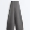 Pantalones de piqué de algodón de talle alto y corte ancho Pantalones de piqué de algodón de talle alto y corte ancho