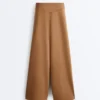 Pantalones de talle alto y corte ancho con efecto neopreno
