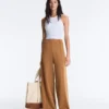 Pantalones de talle alto y corte ancho con efecto neopreno