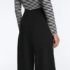 Pantalones de talle alto y corte ancho con efecto neopreno