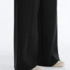 Pantalones de talle alto y corte ancho con efecto neopreno