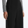 Pantalones de talle alto y corte ancho con efecto neopreno