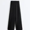 Pantalones de talle alto y corte ancho con efecto neopreno