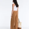 Pantalones de talle alto y corte ancho con efecto neopreno
