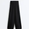 Pantalones de talle alto y corte ancho con efecto neopreno