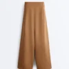 Pantalones de talle alto y corte ancho con efecto neopreno