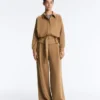 Pantalones de tiro alto de sarga y pierna ancha con pliegues