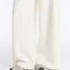 Pantalones de tiro alto de sarga y pierna ancha con pliegues