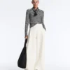 Pantalones de tiro alto de sarga y pierna ancha con pliegues