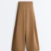 Pantalones de tiro alto de sarga y pierna ancha con pliegues