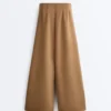 Pantalones de tiro alto de sarga y pierna ancha con pliegues