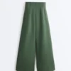 Pantalones de tiro alto de sarga y pierna ancha con pliegues