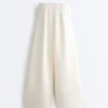 Pantalones de tiro alto de sarga y pierna ancha con pliegues