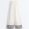 Pantalones rectos de punto con textura ondulada
