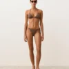 Braguitas de bikini de cobertura media con lazo y estampado de lunares pequeños Braguitas de bikini de cobertura media con lazo y estampado de lunares pequeños