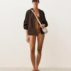 Braguitas de bikini de cobertura media con lazo y estampado de lunares pequeños Braguitas de bikini de cobertura media con lazo y estampado de lunares pequeños
