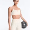 Sujetador deportivo Evermove de sujeción ligera con estampado floral Sujetador deportivo Evermove de sujeción ligera con estampado floral